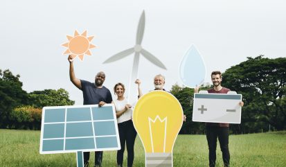 People holding energy saving icons