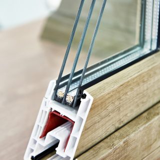 Insulated triple glazing at cross section