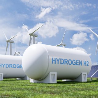 Hydrogen energy storage gas tank for clean electricity solar and wind turbine facility.3d rendering